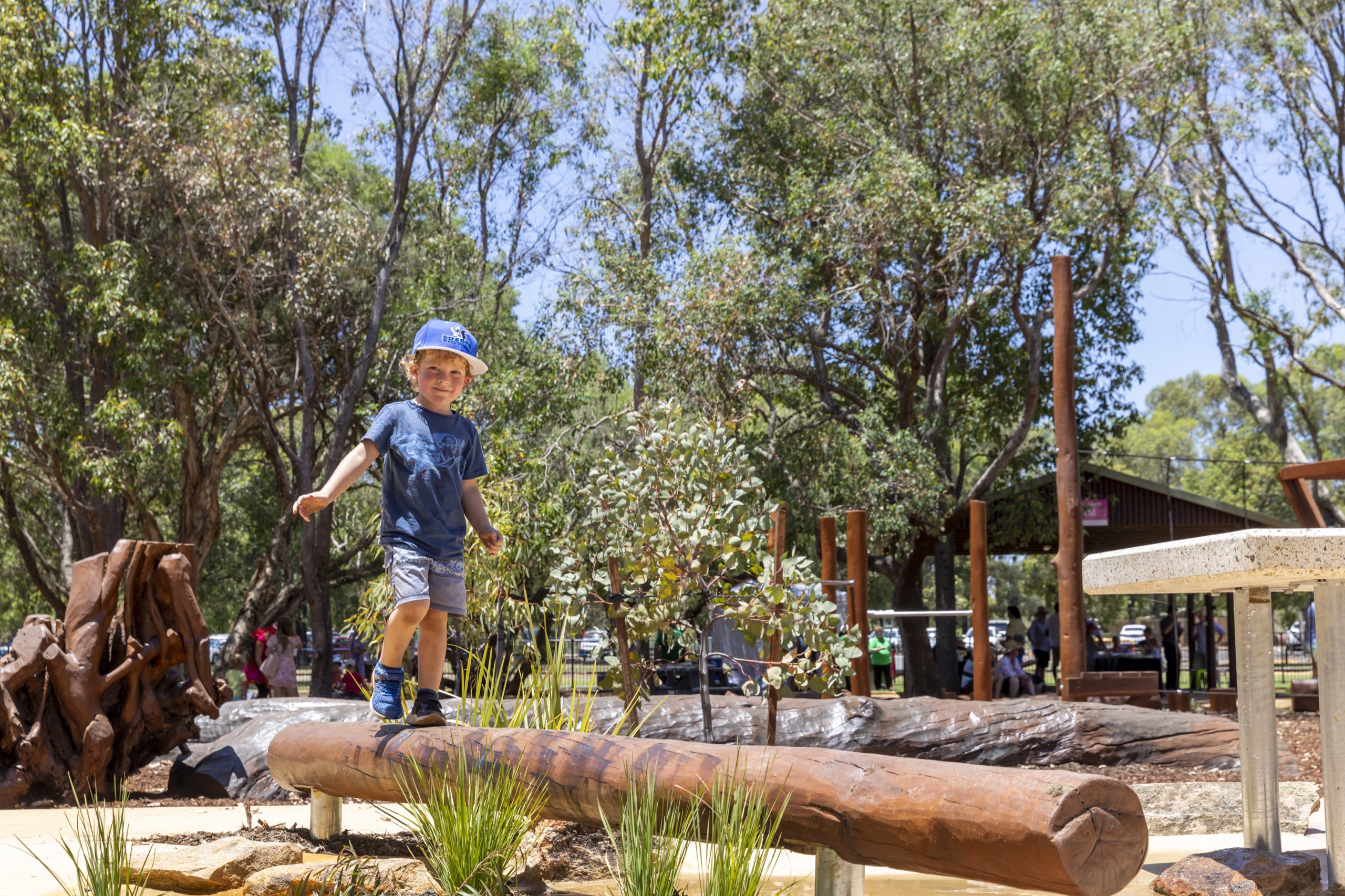 Playgrounds - Pia's Place - boy on balance beam }}