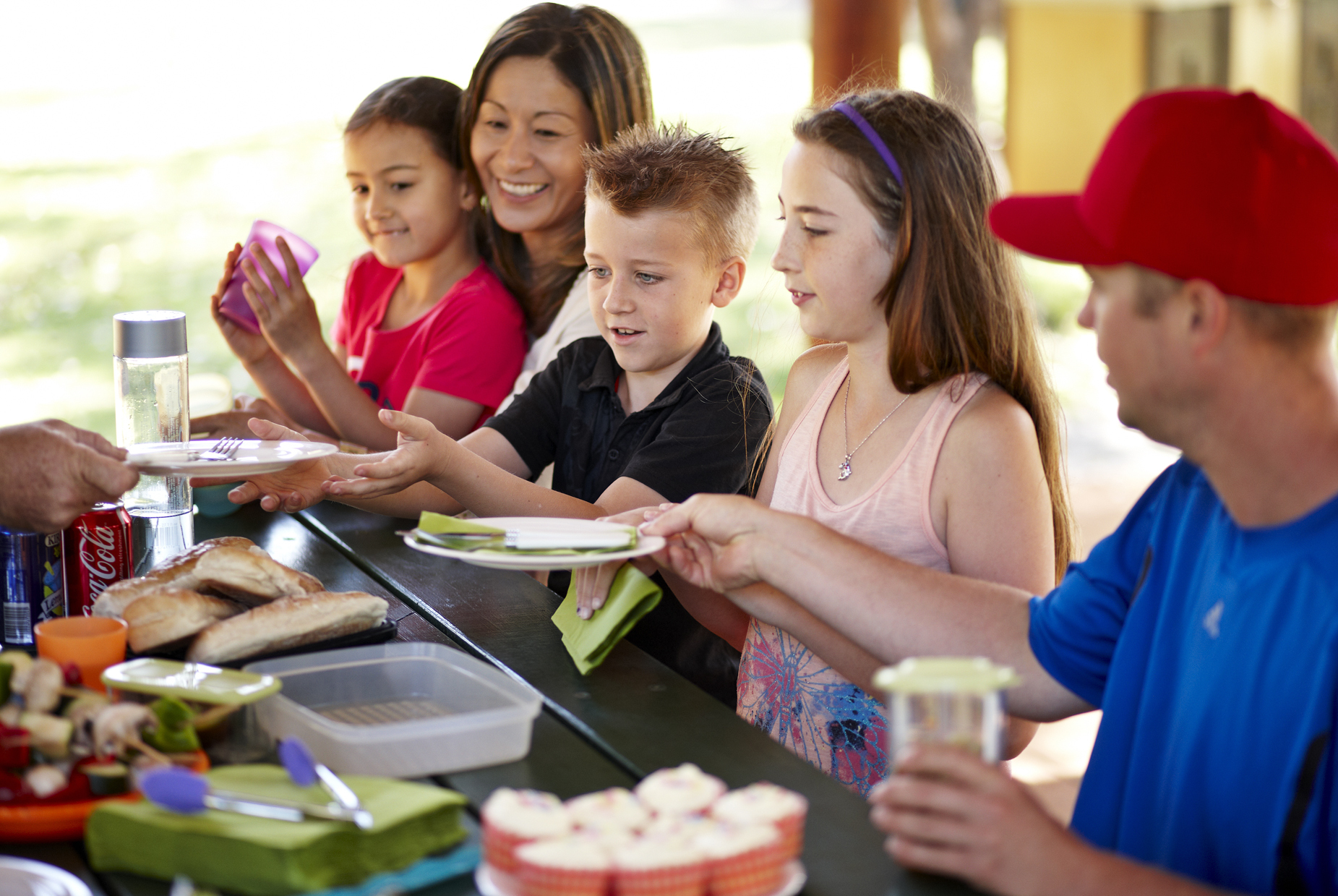 Family picnic at Whiteman Park lunch time }}