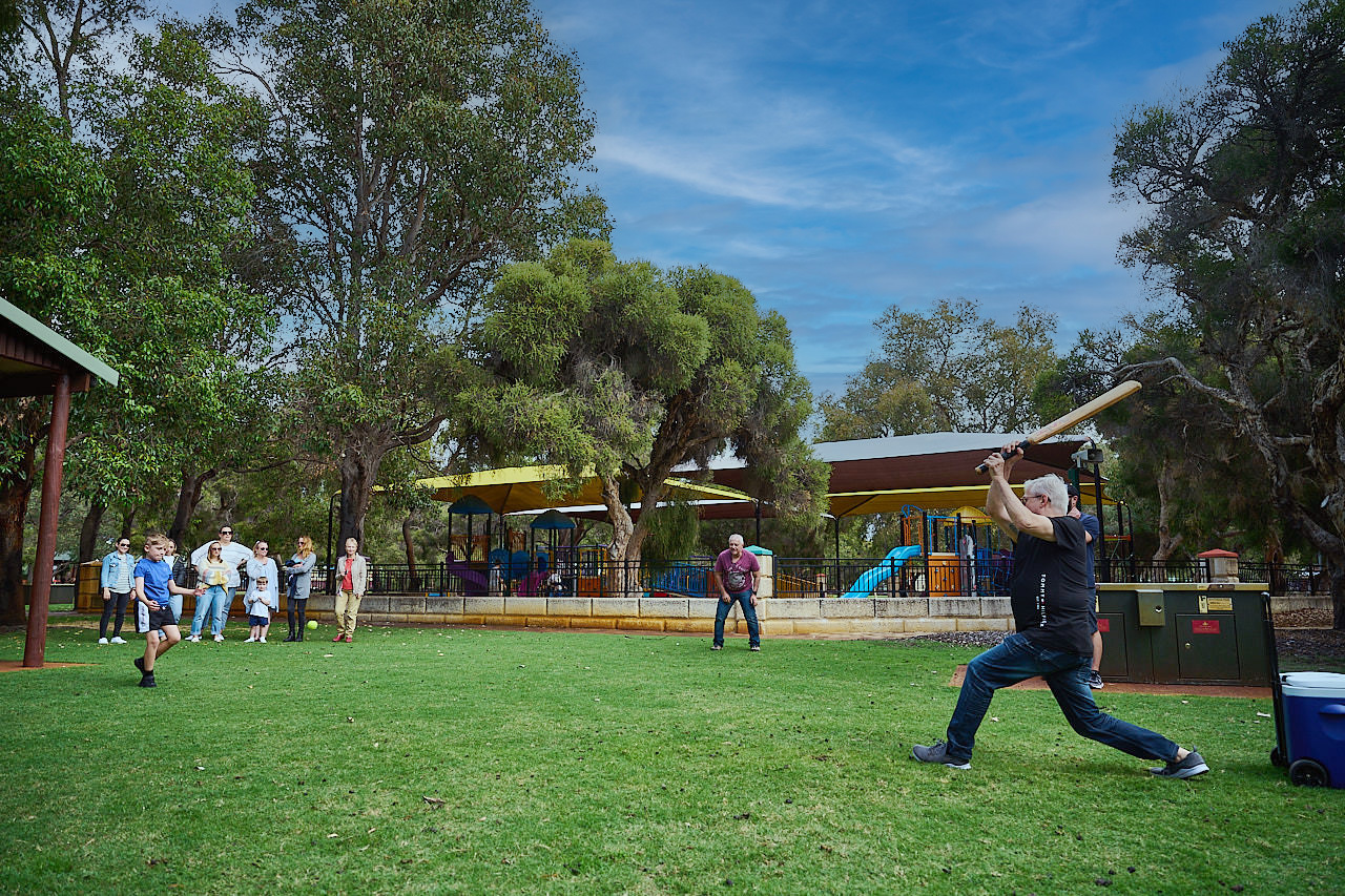Whiteman Park exercise playing family cricket copy }}