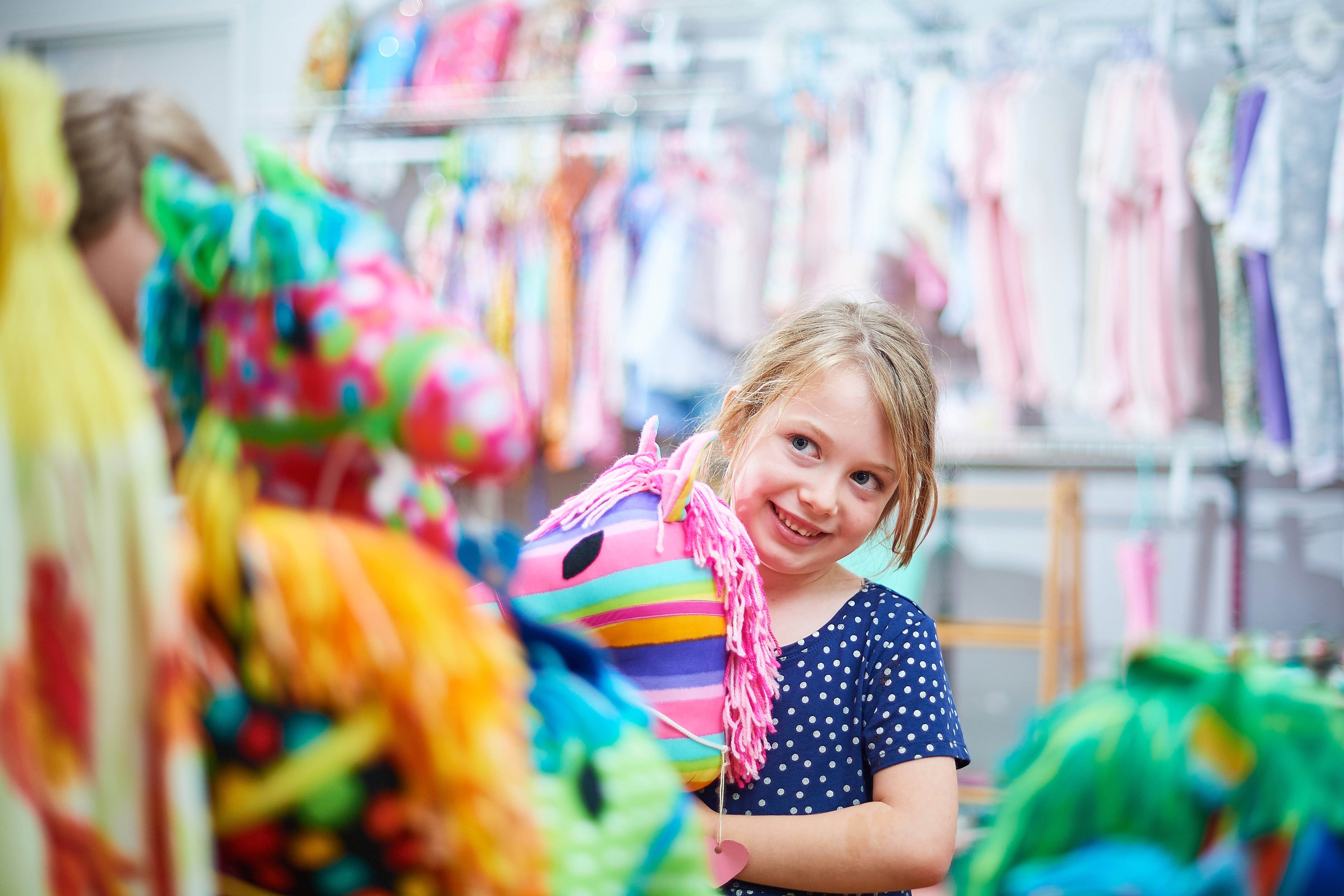 209 Whiteman Park Handcraft Centre child with pony WEB BANNER }}