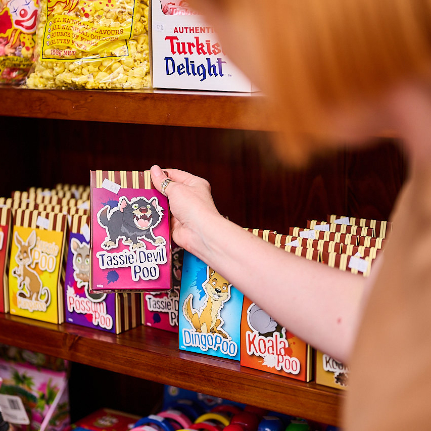 Lolly Stop Whiteman Park picking choc boxes WEB SQ }}